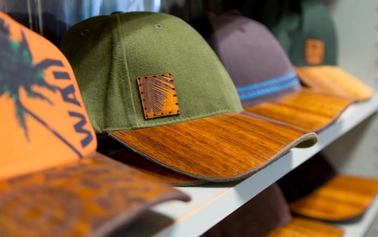 colorful hats sitting on a shelf